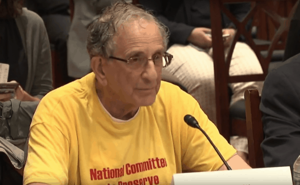 National Committee volunteer John Glaser testifies to the importance of Medicare on the program's 53rd anniversary