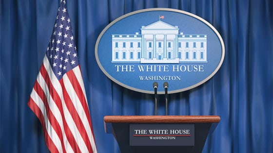 Podium ith white house image and flag